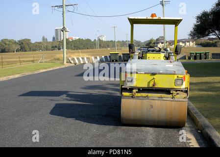 Idle road building machine in Australia Stock Photo