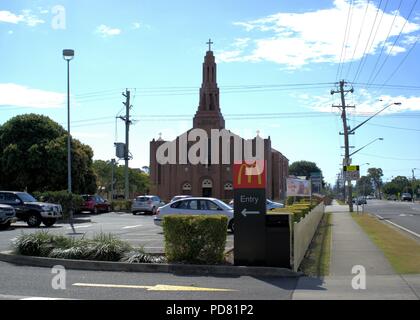 McDonalds entry with St Marys Catholic Church in background at Australian town of Casino Stock Photo