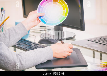 Designer using graphics tablet in the office Stock Photo