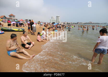 Qingdao, Qingdao, China. 7th Aug, 2018. Qingdao, CHINA-Tourists flock to the beach during summer vacation in Qingdao, east China's Shandong Province. Credit: SIPA Asia/ZUMA Wire/Alamy Live News Stock Photo