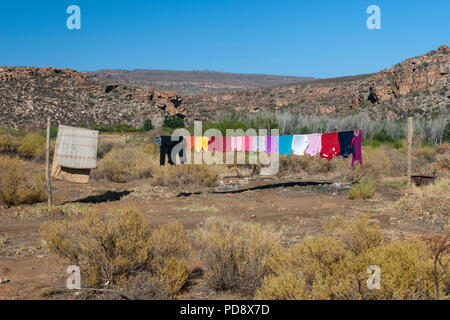 Washing drying outside a house in the Biedouw Valley in the Cederberg Mountains in South Africa. Stock Photo