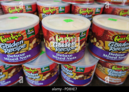 Tins of Mixed Nuts, Grocery Store End Aisle, Montana, USA Stock Photo