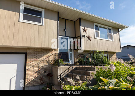 Residential House Exterior in Middle Class Neighborhood, MT, USA Stock Photo