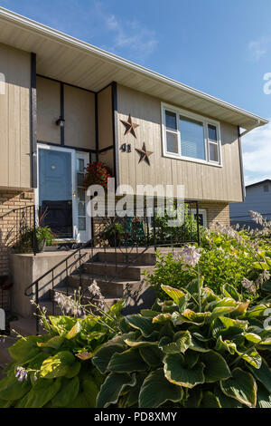 Residential House Exterior in Middle Class Neighborhood, MT, USA Stock Photo