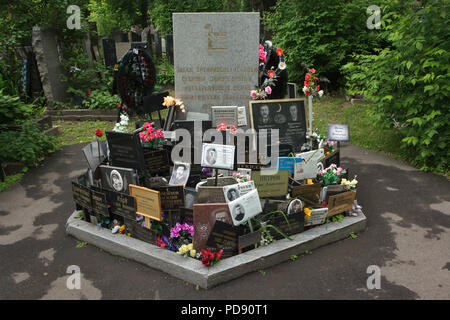 Communal grave of unclaimed ashes number one, where people executed by the NKVD were secretly buried from 1930 to 1942, at the Donskoye Cemetery in Moscow, Russia. It is believed the mass grave contains the remains of 4259 victims of Stalin's regime. The plaques with the names were installed by the relatives since the 1980s. Text in Russian on the tombstone means: Remains of the innocent victims of political repressions tortured and executed in 1930-1942 are buried here, to their eternal memory. Stock Photo