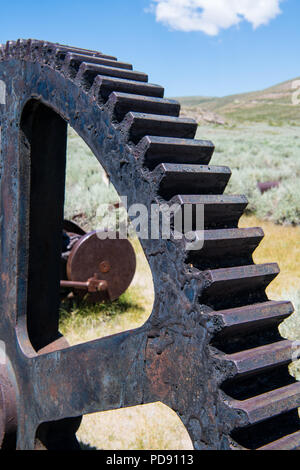 Close-up view of a vintage industrial rusted gear wheel in the ghost town of Bodie, California Stock Photo