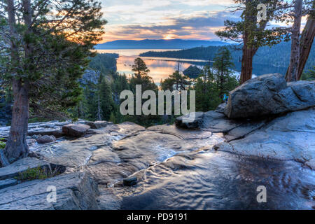 Colorful sunrise on Emerald Bay from the top of Eagle Falls off Lake Tahoe in California. Stock Photo