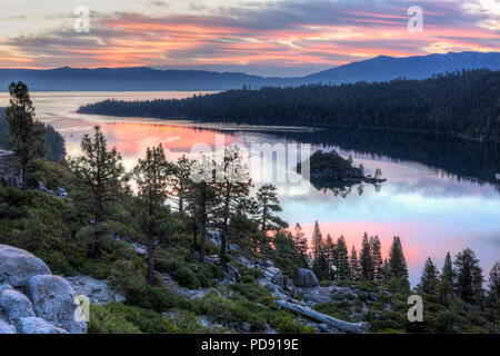 Colorful sunrise over Emerald Bay and Eagle Point off Lake Tahoe in California.