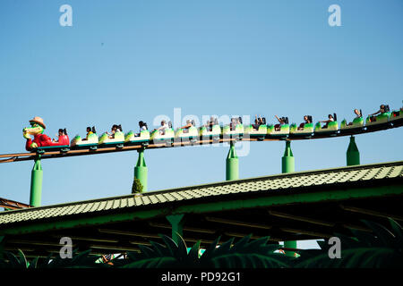 Southend on Sea, Essex. Adventure Island fun fair. Visitors enjoy an aerial ride Stock Photo