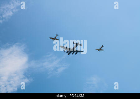 A Lancaster, Hurricane and Spitfire of The Battle of Britain Memorial Flight celebrate the 100th Anniversary of the Royal Air Force Stock Photo