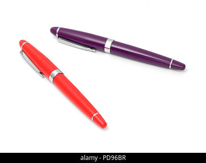 Orange and purple writing pens Stock Photo