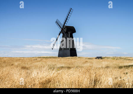 Beacon Mill (or New Mill) - a Grade II listed smock mill at Rottingdean, East Sussex on a sunny summer day Stock Photo