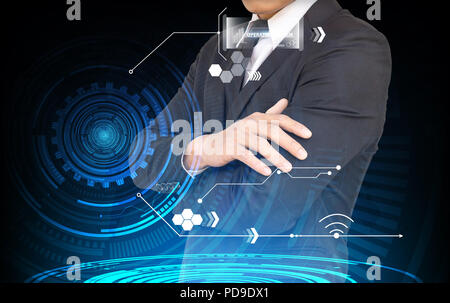 Businessman interface against blue Stock Photo