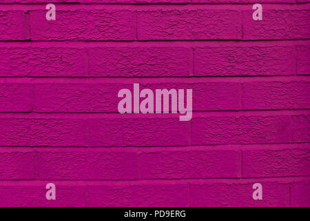 Close-up of the pink, amaranth, fuchsia, purple, ultra violet painted wall brick background Stock Photo