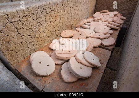 Heat damage caused to thermalite building blocks, biscuit firing clay in kiln with cone 7 causing cracks and scorching of cement, ceramic product Stock Photo