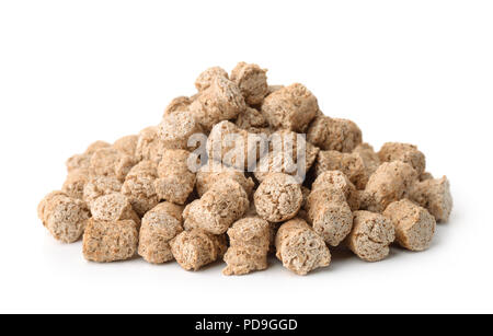 Pile of oats bran pellets isolated on white Stock Photo