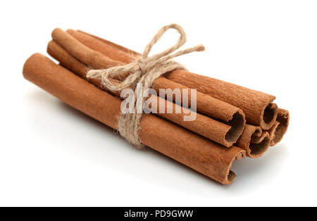 Bundle of сinnamon sticks isolated on white Stock Photo