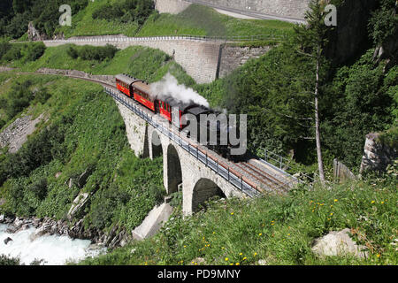 Furka Cogwheel Steam Railway as FO9 approaches  Gletsch  on 11.7.15 Stock Photo