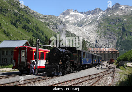 Furka Cogwheel Steam Railway as FO4 pauses at  Gletsch on 10.7.15 Stock Photo