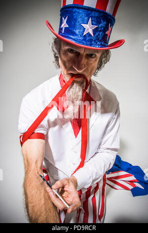Uncle Sam with rolled up sleeve shooting up with a syringe as if with heroine. Concept of addicted to oil. Stock Photo