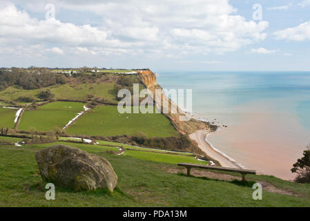 Scenic view along the Jurassic Coast of Lyme Bay looking eastwards from Sidmouth, Devon, England, UK on a sunny late winter/early spring day. Stock Photo