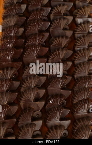 Chocolate bars, pralines and truffles of different kinds Stock Photo