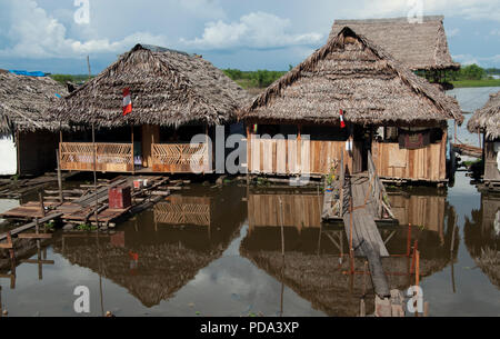 Traditional house on the Amazon river in Iquitos, Peru. Stock Photo