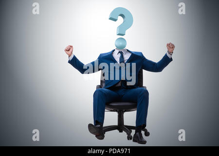 Businessman with question mark instead of head Stock Photo