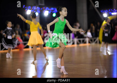 Baby dancers performing at the ballroom during Ukraine Cup among juniors and babies. July 25, 2018. Kiev, Ukraine Stock Photo