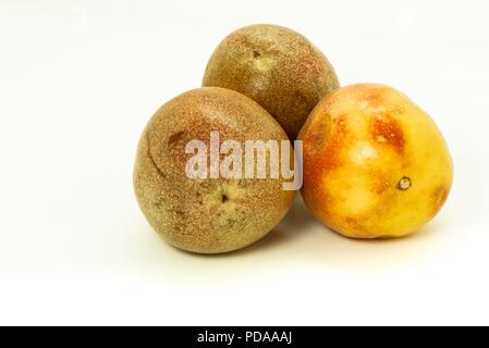 Closeup of passion fruits isolated on white Stock Photo