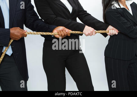 Diverse group of business concept. Tug of War. Stock Photo