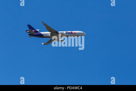 FedEx plane in flight Stock Photo