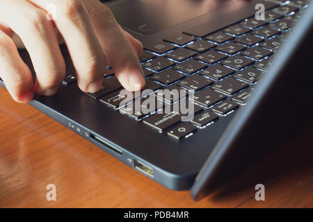 man using laptop Stock Photo