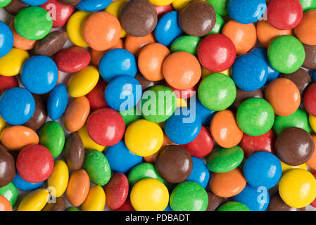 Multi colored m&m candies randomly arranged Stock Photo