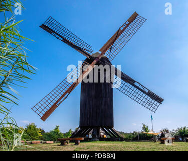 Reconstructed 18th-century wooden windmill with a small museum & grinding demonstrations.Pudagla, Mecklenburg-West Pomerania,Germany Stock Photo