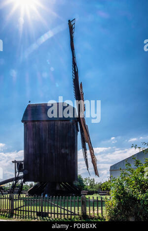 Reconstructed 18th-century wooden windmill with a small museum & grinding demonstrations.Pudagla, Mecklenburg-West Pomerania,Germany Stock Photo