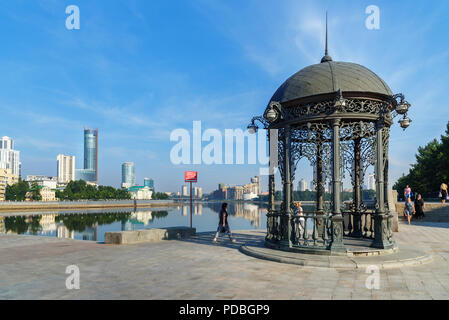 Yekaterinburg, Russia - July 24, 2018: Rotunda on the embankment in the center of Yekaterinburg. View of city center skyline and Iset river Stock Photo