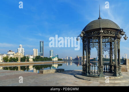 Rotunda on the embankment in the center of Yekaterinburg. View of city center skyline and Iset river. Russia Stock Photo