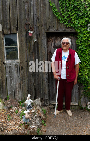 Partially sighted woman suffering from age-related Macular degeneration Stock Photo