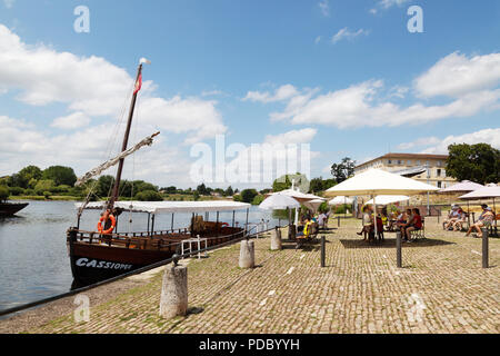 A Gabarre or traditional boat on the Dordogne river at Bergerac for tourist boat trips; Bergerac, Dordogne, France Europe Stock Photo
