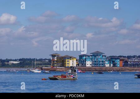 Colourful Luxury Flats on Exmouth Marina. Exe Estuary Boats on a Summers Day. Devon, UK. Stock Photo