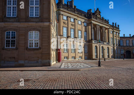 Empty square with beautiful Amalienborg palace and street lamps, copenhagen, denmark Stock Photo