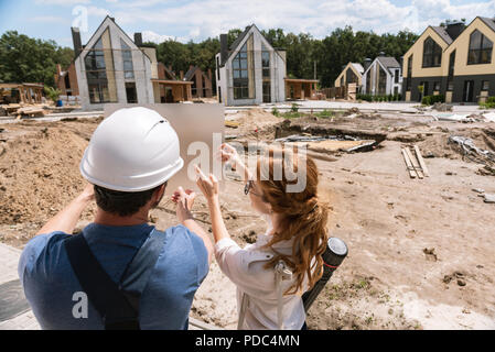 Intelligent professional architects sharing their ideas Stock Photo