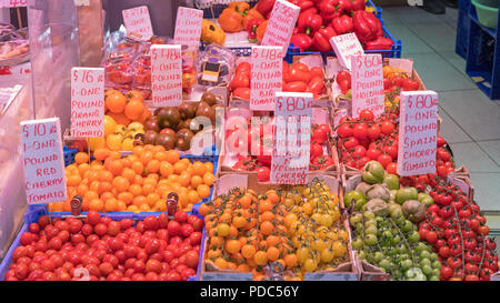 Big Selection of Various Tomatoes in Tomato Shop Stock Photo