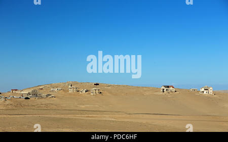 General view of Kolmanskop, a former diamond-mining town abandoned to the Namib desert in the 1950s. Stock Photo