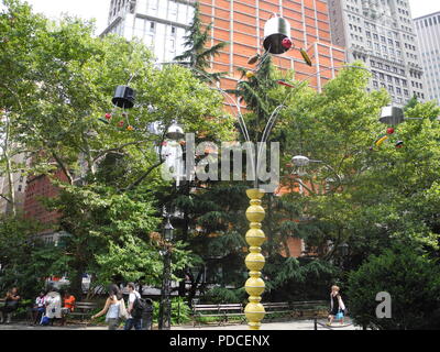New York, USA. 07th Aug, 2018. Trees made of frying pans, cooking pots and drip strainers by the US artist Bill Wurtz, who usually only appears as B. Wurtz. They are part of the exhibition 'Kitchen Trees' and are located in the park in front of the city council. Credit: Johannes Schmitt-Tegge/dpa/Alamy Live News Stock Photo