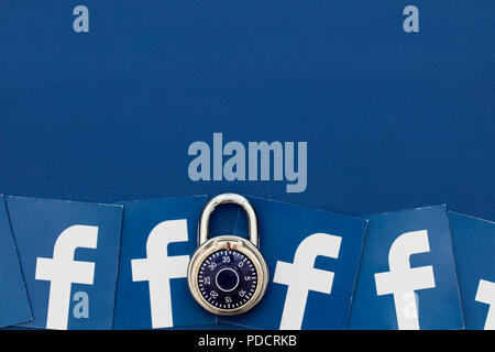 LONDON, UK - AUGUST 8th 2018: Facebook data security concept. A combination padlock with the facebook social media logo Stock Photo