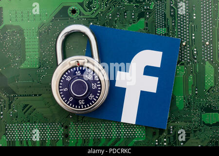 LONDON, UK - AUGUST 8th 2018: Facebook data security concept. A combination padlock with the facebook social media logo Stock Photo