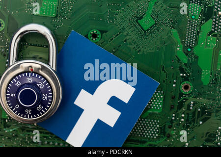 LONDON, UK - AUGUST 8th 2018: Facebook data security concept. A combination padlock with the facebook social media logo Stock Photo