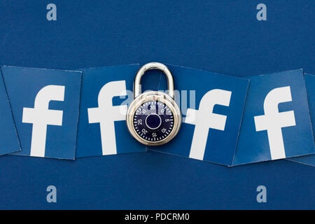 LONDON, UK - AUGUST 8th 2018: Facebook data security concept. A combination padlock with the facebook social media logo Stock Photo